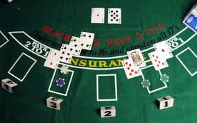 Live dealer table environment with cards and gaming setup